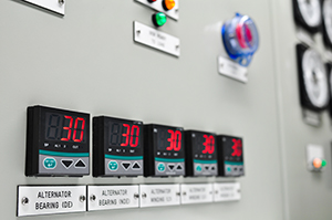 Water and electricity meters in power plant.